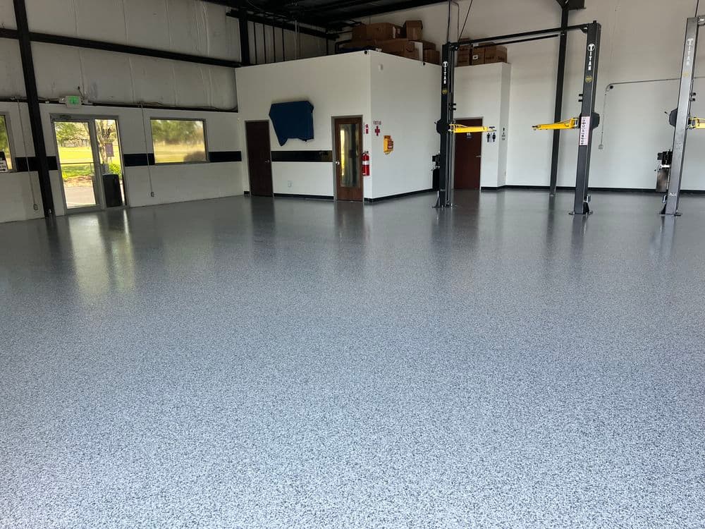 Gallery photos for Full-Broadcast Flake Epoxy Floor at Wrenchworks in Westfield: Image #1
