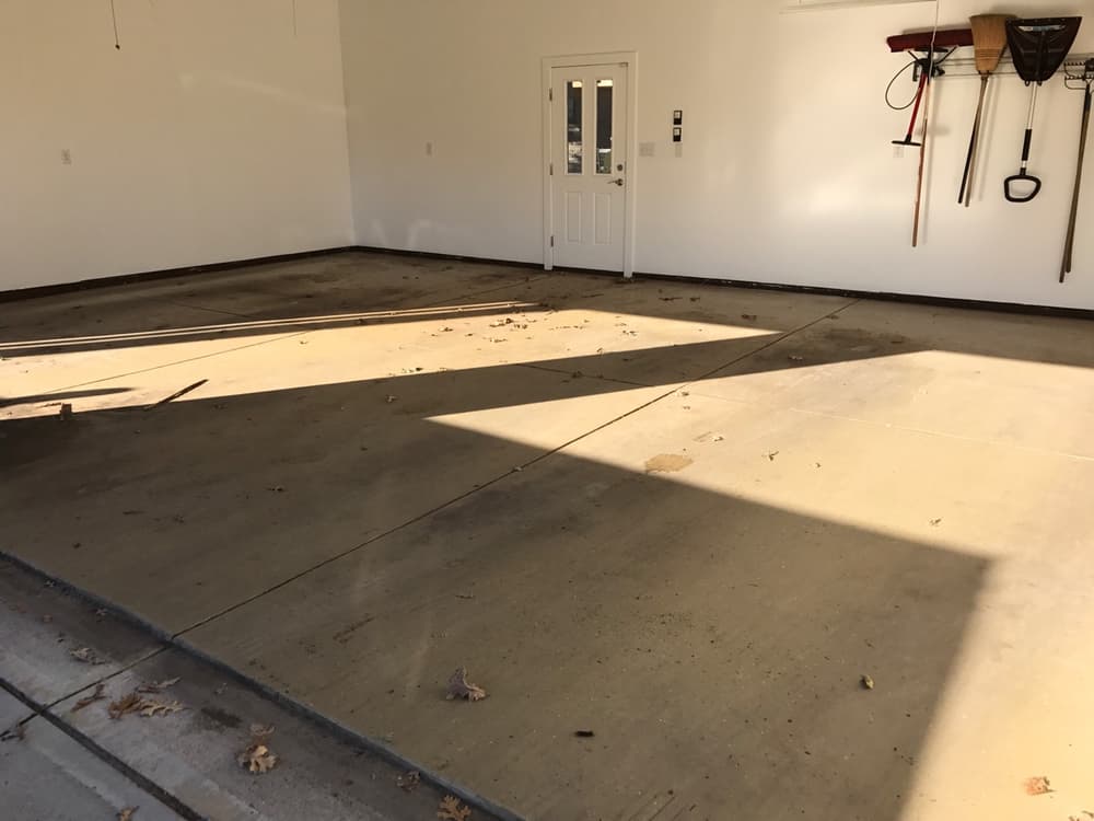 Click to see the transformation! Garage Floor Epoxy Coating Before and After in Carmel image