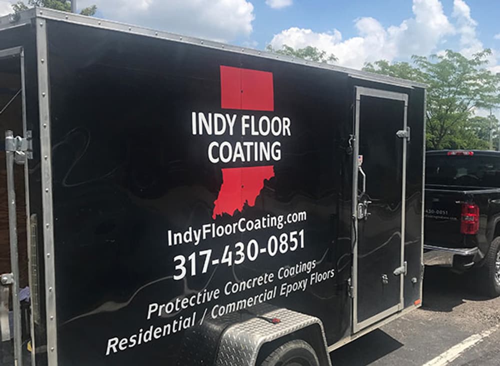 INDY FLOOR COATING trailer with contact details and services for concrete epoxy flooring.